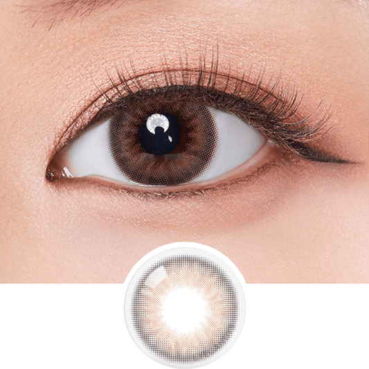 Macro shot of an eye wearing the Olola Dazzling 1-Day Rosie Hazel (10pk) (KR) colour contact lens, showing the multi-colored detail and natural effect on dark brown eyes, with clean eye makeup